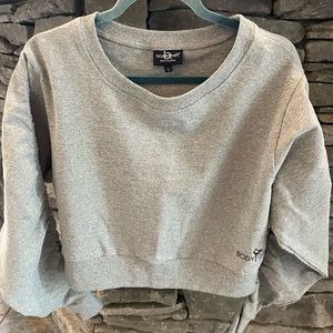 Cropped pull over with cinch sleeves brand new!